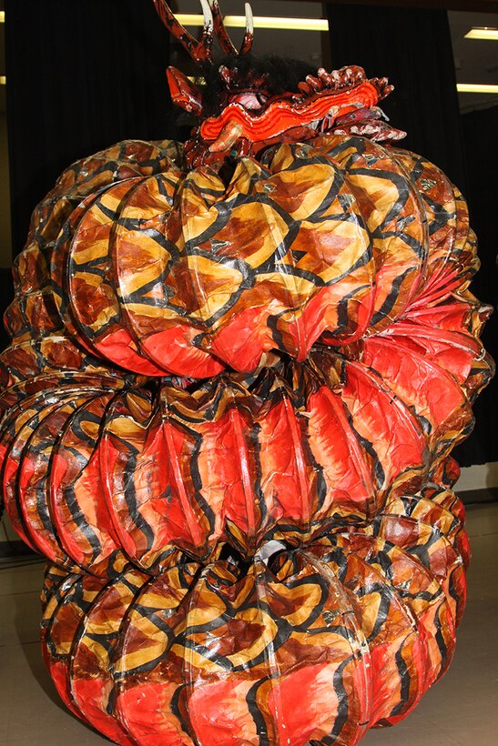 One of the dragons in the dragon dance curls up during the Japanese American Society culture event here March 4. Participants were able to experience Japanese culture thanks to visiting Japanese nationals.