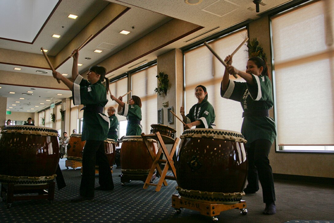 Department of Defense members give a Taiko drum performance along side Japanese civilians at the Eagles Nest here May 31, 2012.