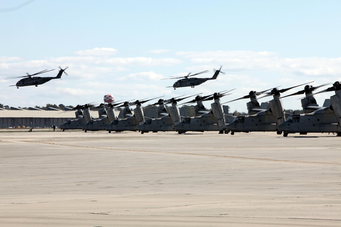 The Marines from Marine Medium Tiltrotor Squadron 266 Reinforced fly their MV-22B Ospreys in formation above Marine Corps Air Station New River during their homecoming ceremony, Nov. 4. Marines from VMM-266 (Rein.) were greeted by a crowd of friends and family who the Marines haven't seen since they departed for the 26th Marine Expeditionary Unit 26, 8 months ago.