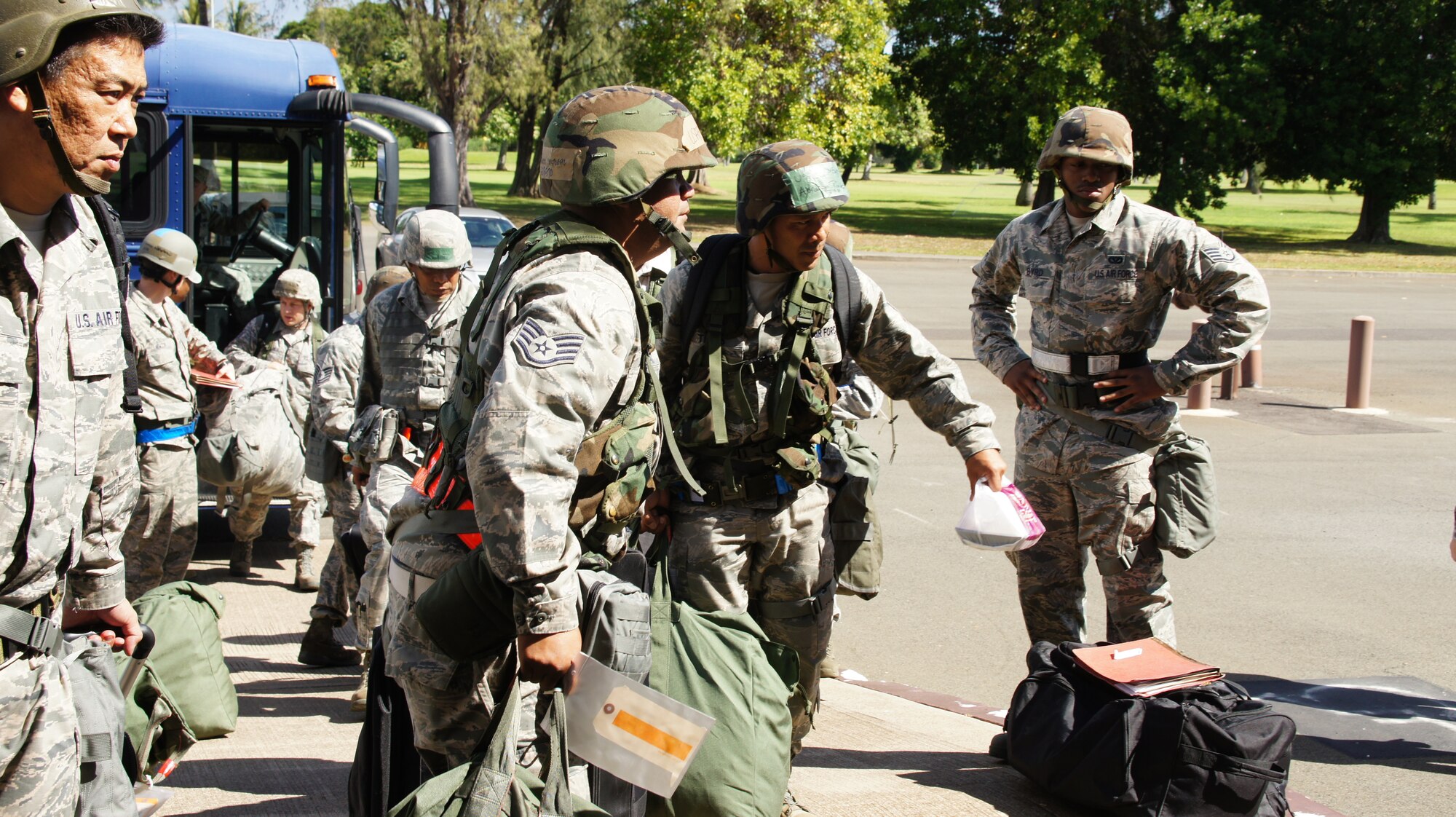 With bags packed and eyes focused, deployers from the Hawaii National Guard’s 154th Wing and Active Duty Air Force’s 15th arrive at the mobility line for an exercise deployment during a Combined Unit Inspection, Nov. 03 at Joint Base Pearl Harbor-Hickam. The CUI is the final step in over 18 months of preparation and exercises by the active duty’s 15th Wing and the Hawaii Air National Guard’s 154th Wing. The inspection allows the wings to prove their ability to deploy quickly in response to an international threat, and their operational readiness in a foreign combat scenario. (Air National Guard photo/Tech. Sgt. Andrew Jackson/Released)