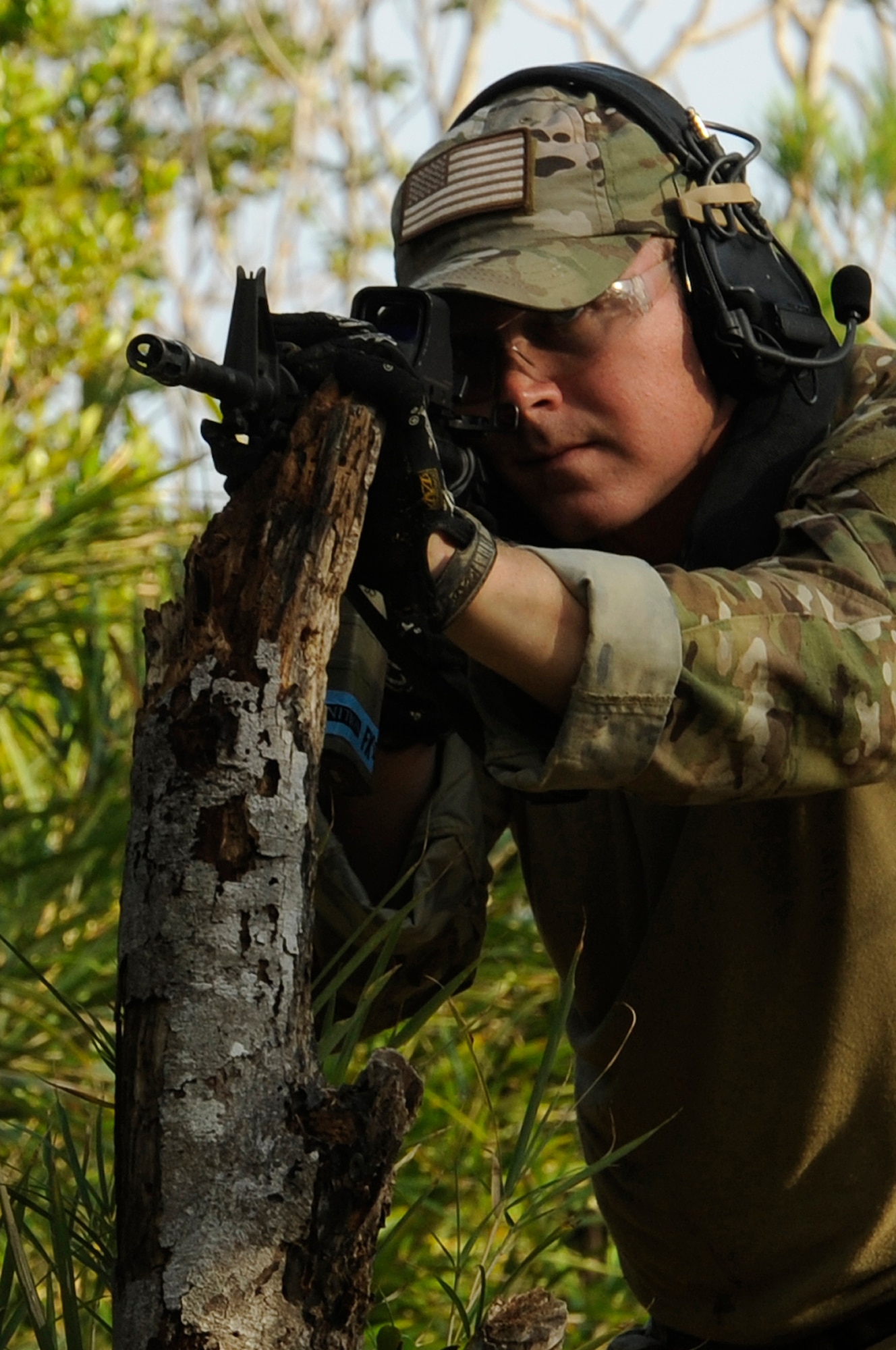 U.S. Air Force Tech. Sgt. Matthew Campbell, 31st Rescue Squadron combat arms NCO in charge, guards pararescuemen during a war week exercise at Marine Corps Camp Hansen's training area, Japan, Oct. 29, 2013. Airmen from the 31st RQS and 33rd Rescue Squadron on Kadena Air Base; 212th Air National Guard from Joint Base Elmendorf-Richardson, Anchorage, Alaska; and the 48th Rescue Squadron of Davis-Monthan Air Force Base, Arizona; participated in the three-day exercise in order to prepare for potential real-life situations while deployed down-range. (U.S. Air Force photo by Senior Airman Marcus Morris)