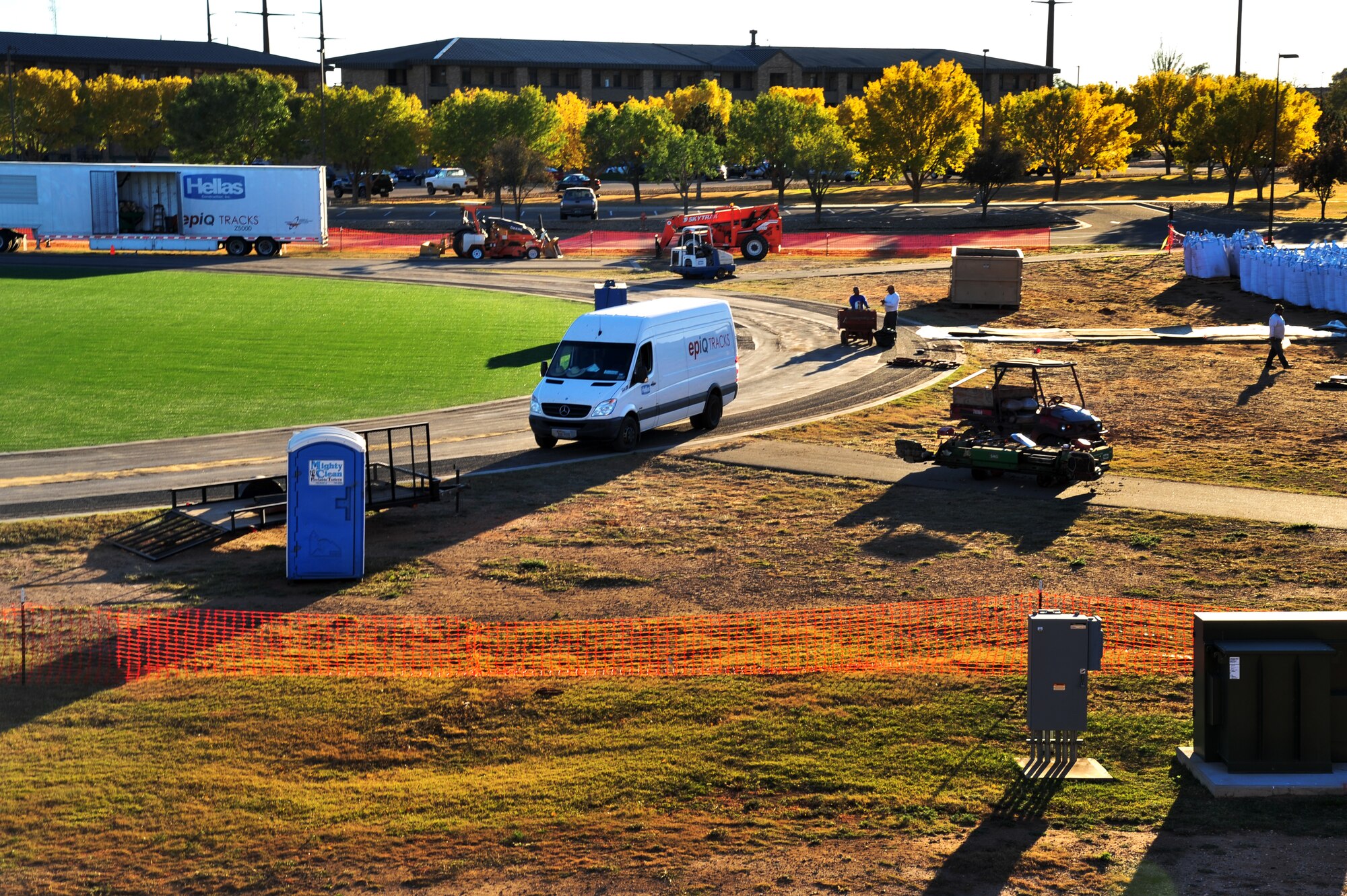 Construction continues as workers clear the track in preparation for a new rubberized surface Nov. 1, 2013, at Cannon Air Force Base, N.M.  Because of the high level of usage since its opening in 2009, the track was in need of repair.  (U.S. Air Force photo/Senior Airman Jette Carr)