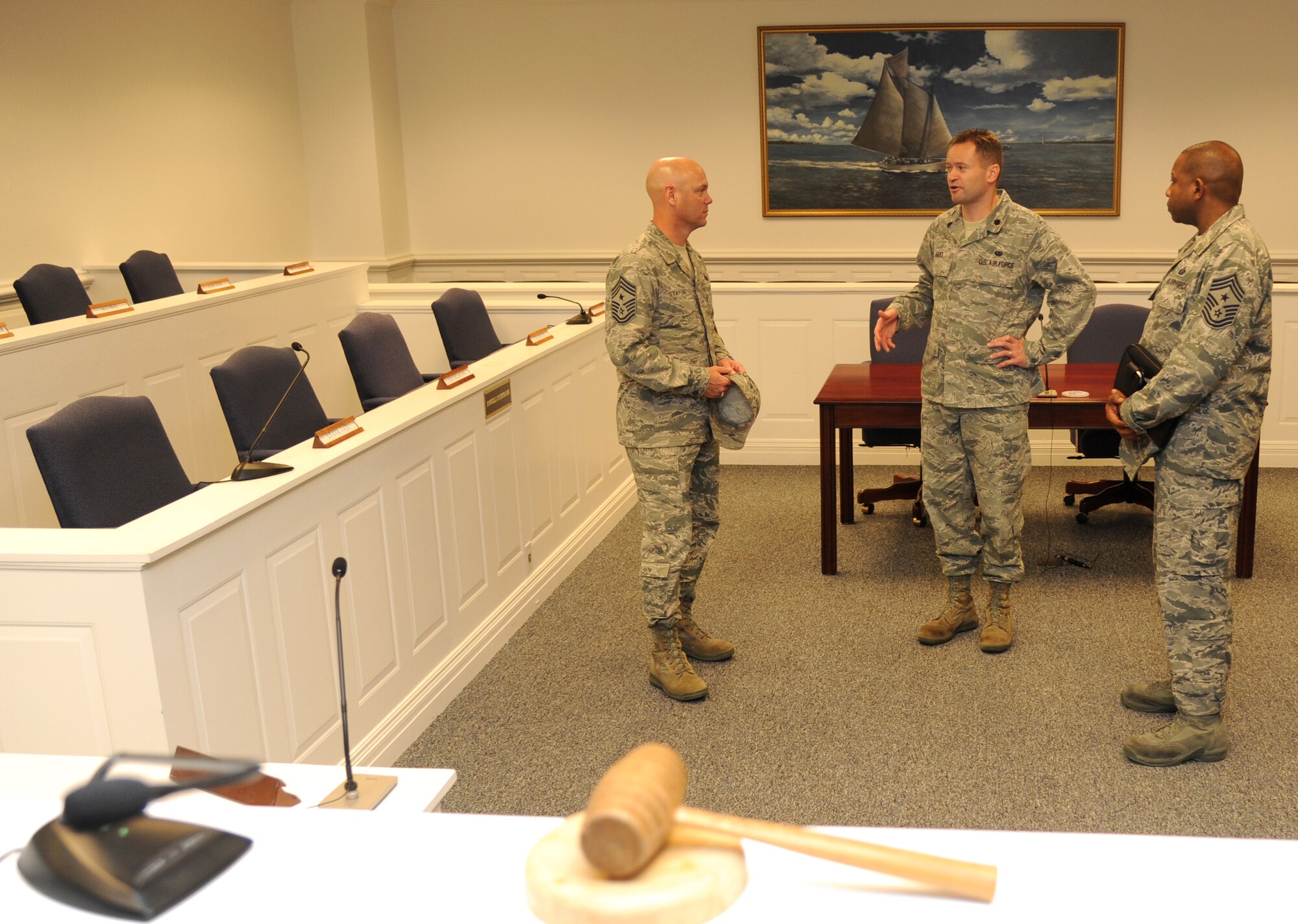 U.S. Air Force Lt. Col. Brandon Hart, 81st Training Wing, (center), provides a tour of the court room and legal offices to Chief Master Sgts. David Staton, 2nd Air Force command chief, and Farrell Thomas, 81st Training Wing command chief, during an immersion tour Nov. 1, 2013, at the Sablich Center, Keesler Air Force Base, Miss.  The purpose of the tour was for Thomas and Staton to become familiar with the integration of group mission, operations and personnel.  (U.S. Air Force photo by Kemberly Groue)