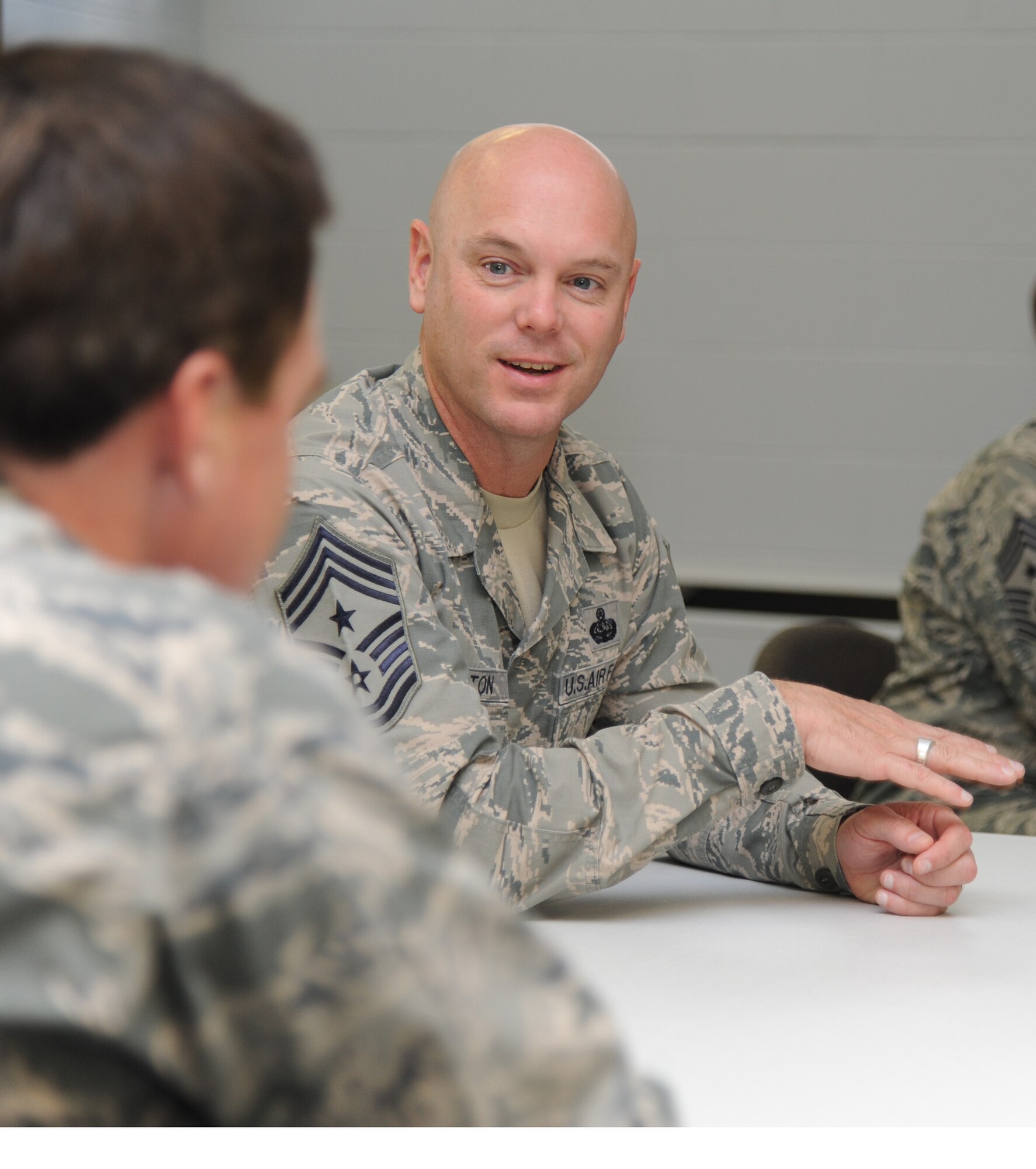 U.S. Air Force Chief Master Sgt. David Staton, 2nd Air Force command chief, speaks with Maj. Robert Monagle, 81st Training Wing, at a briefing on the responsibilities of the chaplain’s office during an immersion tour Nov. 1, 2013, at the Larcher Chapel, Keesler Air Force Base, Miss.  The purpose of the tour was for Staton to become familiar with the base mission, operations and personnel. (U.S. Air Force photo by Kemberly Groue)