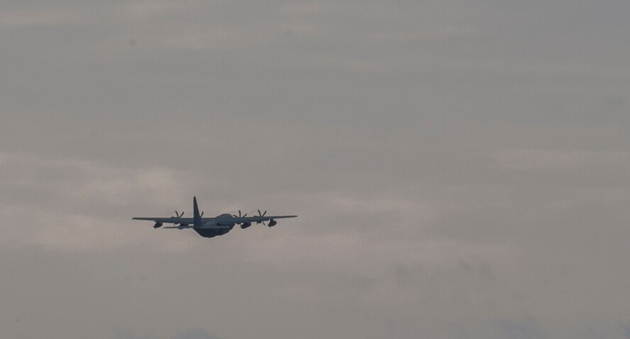 An HC-130J Combat King II flies for the first time at Moody Air Force Base, Ga., Nov. 1, 2013. The aircraft flew a three and a half hour mission to Savannah, Ga., and back.  (U.S. Air Force photo by Airman 1st Class Alexis Grotz/Released) 