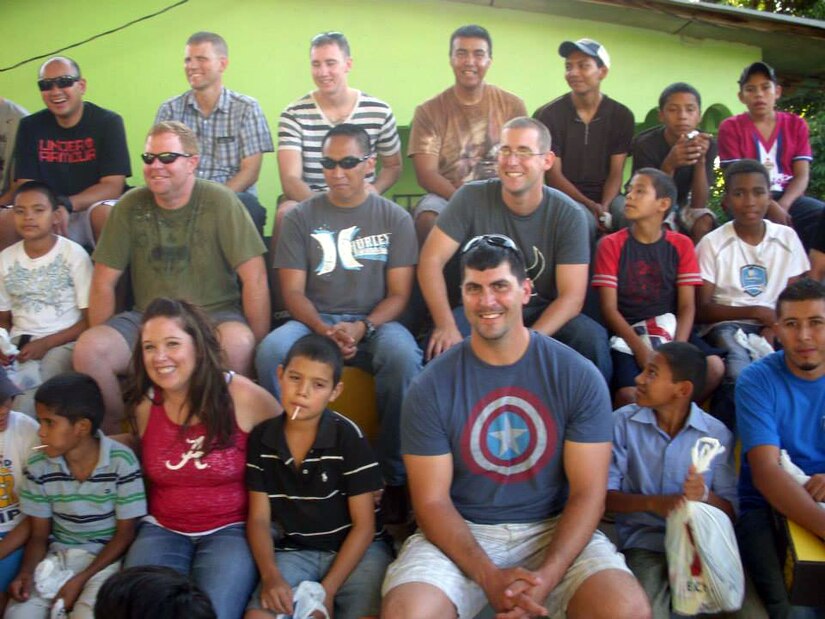 Members of Joint Task Force-Bravo's Army Forces (ARFOR) Battalion paid a visit to the children of the Horizontes al Futuro orphanage in Comayagua, Honduras, Nov. 3, 2013.  The ARFOR members brought sandwiches, chips and drinks for the children for lunch, and spent the day playing games and visiting with the kids.  (U.S. Air Force photo by Master Sgt. Terry LaBreck)