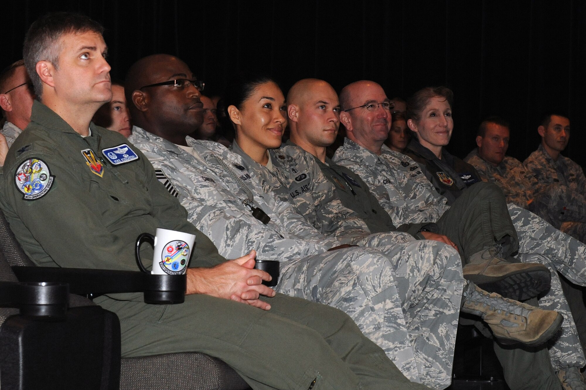 Members of Team Seymour listen to Chief Master Sgt. Richard Parsons, Air Combat Command command chief, during a briefing at Seymour Johnson Air Force Base, N.C., Oct. 29, 2013. Parsons answered questions concerning changes the Air force is facing such as a master sergeant promotion board and better financial training for Airmen. (U.S. Air Force photo by Airman 1st Class Aaron J. Jenne)