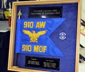 YOUNGSTOWN AIR RESERVE STATION, Ohio—The 910th Maintenance Operations Flight flag was placed in a case during a deactivation ceremony, here, Nov. 2, 2013. During the ceremony, the flag is taken off the staff and placed in a case for safe-keeping. (U.S. Air Force photo by Tech. Sgt. Valerie Smock)