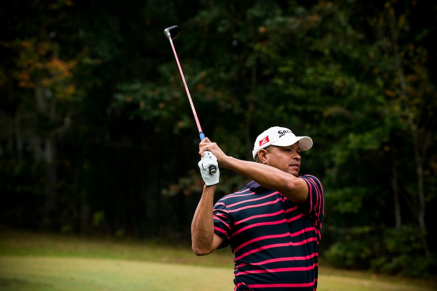 Retired U.S. Air Force Master Sgt. Darryl Bennett, former 23d Medical Group first sergeant, observes his golf ball after a tee shot during the 2013 Retiree Appreciation Week Golf Tournament at Moody Air Force Base, Ga., Nov. 1, 2013. The tournament was one of many events held during Retiree Appreciation Week, a time dedicated to honoring and showing thanks to the local retired military community. (U.S. Air Force photo by Staff Sgt. Jamal D. Sutter/Released)