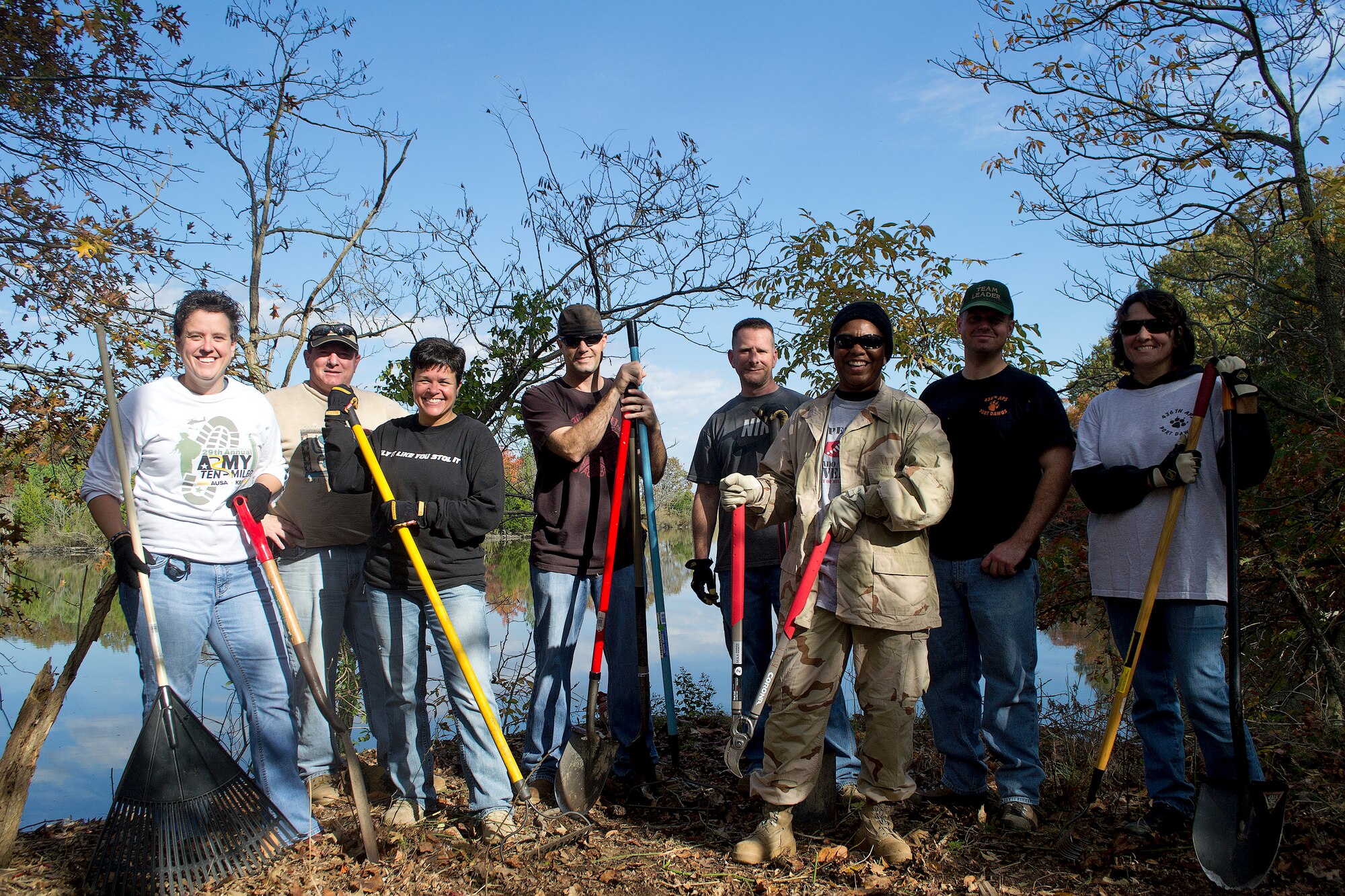 More than 100 Dover Air Force Base Airmen and family members participate in the annual Make-A-Difference-Day Nov. 2, 2013, at Kent County’s Hunn Recreation Area in Dover, Del. Volunteers helped to clear new trails as part of a major trail clearing and reforestation project. (U.S. Air Force photo/1st Lt. Remoshay Nelson) 