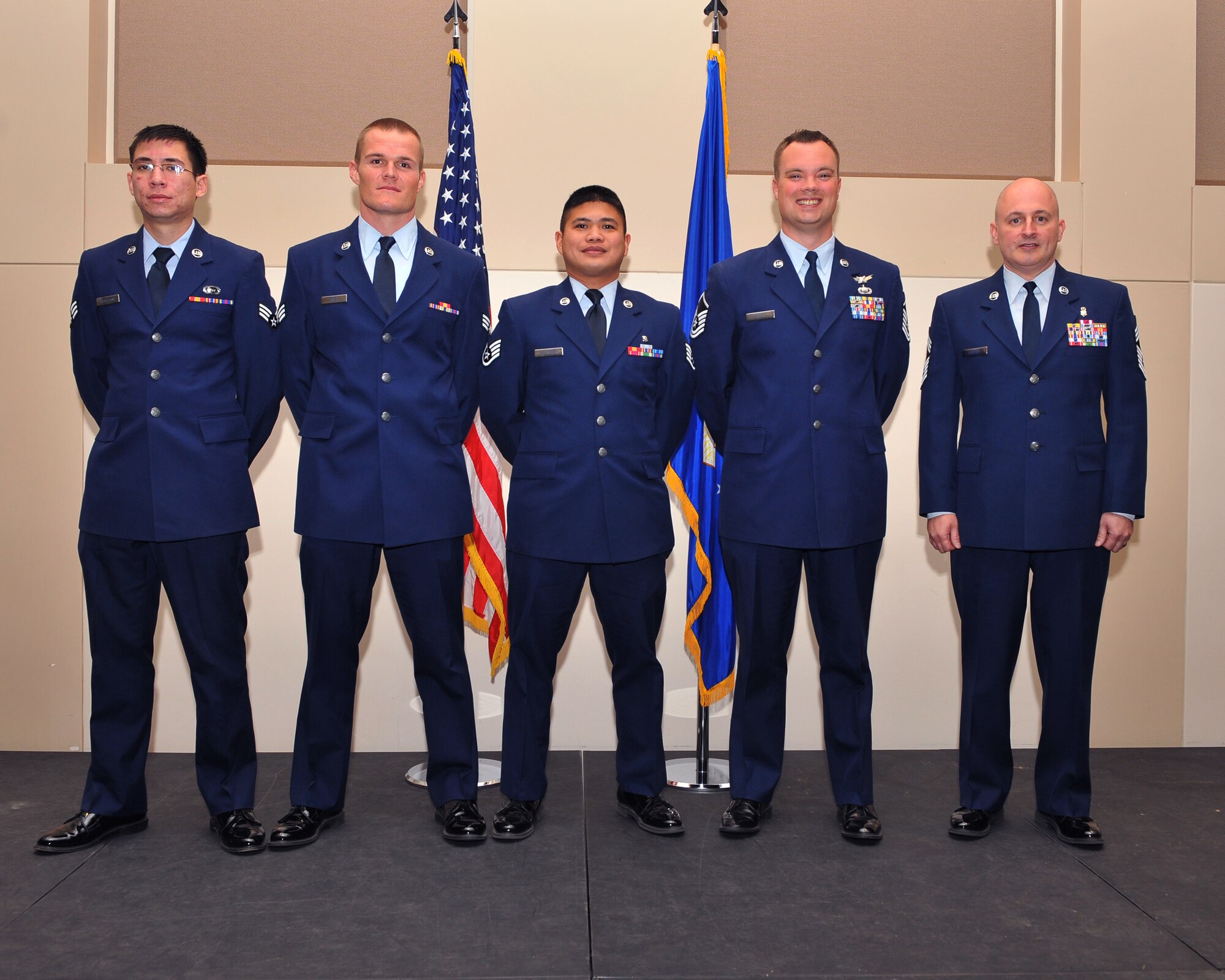 Five members of Team Buckley were promoted to their next ranks Nov. 1, 2013, at the Leadership Development Center at Buckley Air Force Base, Colo. A promotion ceremony is a time-honored tradition in the Air Force, allowing co-workers, family and friends to support and congratulate Airmen on their promotion. (U.S. Air Force photo by Senior Airman Phillip Houk/Released) 