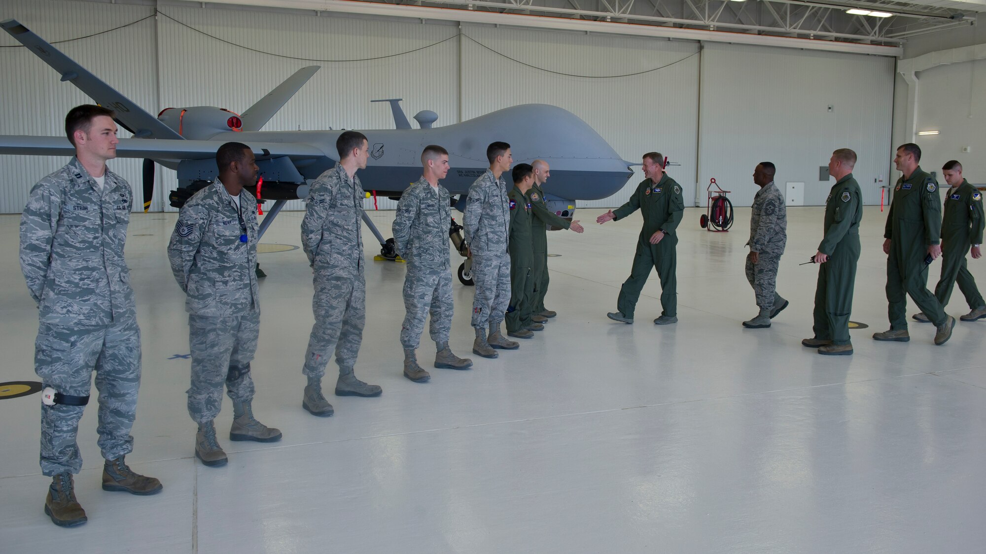 Airmen from the 849th Aircraft Maintenance Squadron greet Lt. Gen. Tod Wolters, 12th Air Force (Air Forces Southern) commander at Holloman Air Force Base, N.M., Oct. 24. Holloman was the first base Gen. Wolters visited after assuming command at Davis-Monthan AFB, Ariz., Sept. 24. The 12th Air Force is responsible for the combat readiness of 10 active duty wings, operating more than 800 aircraft with more than 64,500 uniformed and civilian Airmen. (U.S. Air Force photo by Airman 1st Class Chase Cannon/Released)