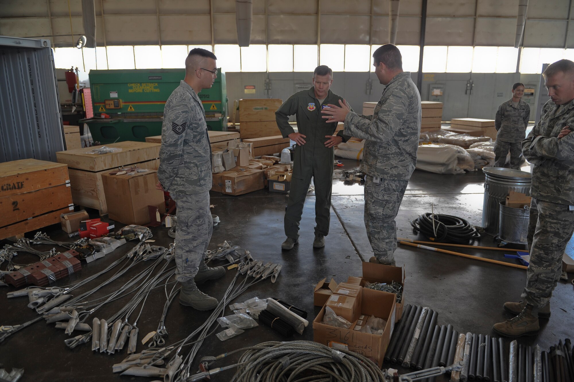 Airmen from the 49th Aircraft Maintenance Squadron describe their daily operations to Lt. Gen. Tod Wolters, 12th Air Force (Air Forces Southern) commander, and 12th Air Force Command Chief Master Sgt. Calvin Williams at Holloman Air Force Base, N.M., Oct. 24. Holloman was the first base Gen. Wolters visited after assuming command at Davis-Monthan AFB, Ariz., Sept. 24. The 12th Air Force is responsible for the combat readiness of 10 active duty wings, operating more than 800 aircraft with more than 64,500 uniformed and civilian Airmen. (U.S. Air Force photo by Airman 1st Class Colin Cates/Released)