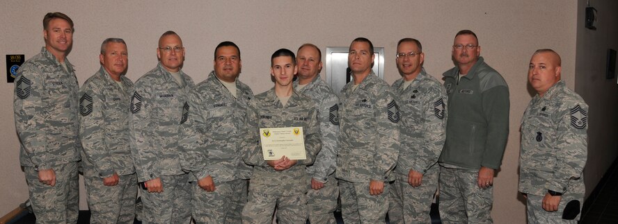 U.S. Air Force Senior Airman Christopher Sorondo, 509th Operations Support Squadron wing scheduler, receives the October Chiefs’ Choice award at Whiteman Air Force Base, Mo., Oct., 25, 2013. Sorondo’s actions aided the 509th Bomb Wing in meeting its fiscal year 2013 goal of flying hour closeout with 100 percent accuracy for the second year in a row. He earned accolades from the director of operations at Air Force Global Strike Command and helped fellow aircrew flight equipment warriors clean Children’s Memorial Park in Warrensburg, Mo. (U.S. Air Force photo by Airman 1st Class Keenan Berry/Released)