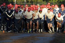 While it may have been the 916th Air Refueling Wing's Warrior Run on Sunday Nov. 3, 2013, a sea of red hats led the semi-annual festivities as the 567th RED HORSE Squadron turned out in full force and won the trophy for most participation. (USAF photo by TSgt. Scotty Sweatt, 916ARW/PA)