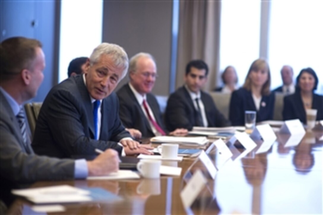 Secretary of Defense Chuck Hagel, second from left, meets with corporate and non-profit veterans organization’s leadership at a round table hosted by J.P. Morgan Chase in New York City, N.Y., on Nov. 1, 2013.   Hagel discussed how to help veterans transitioning into the civilian work force.   