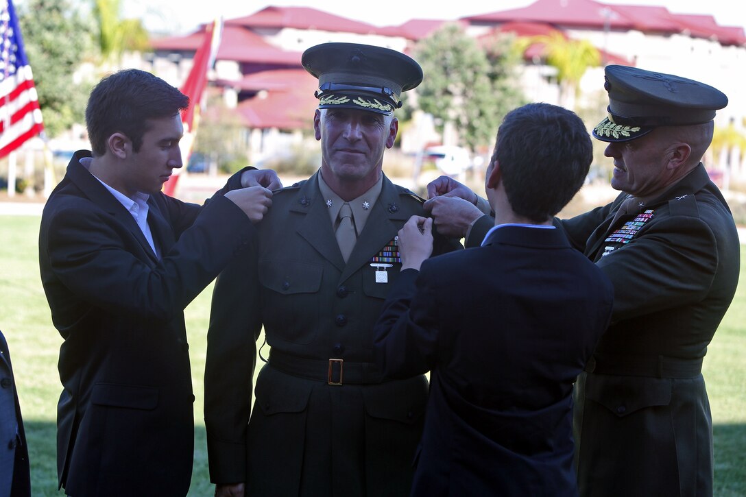 Colonel Joseph J. Zarba, assistant chief of staff, G-4, 1st Marine Logistics Group, is promoted aboard Camp Pendleton, Calif., Nov. 1, 2013. 