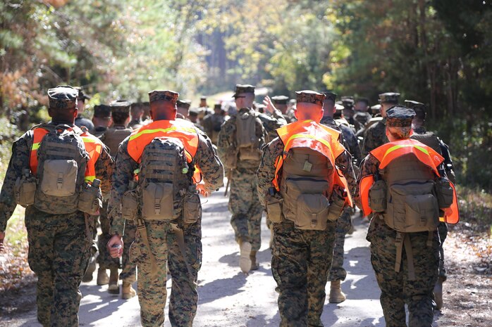 Marines with Marine Aviation Logistics Squadron 29 press on as they participate in a six-mile motivational hike, Nov. 4. The Marines reached their hiking destination and boarded CH-53E Super Stallions for transport to their origin point.