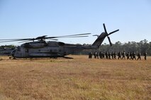 Marines with Marine Aviation Logistics Squadron 29 participate in a six-mile motivational hike, Nov. 4. The Marines reached their hiking destination and boarded CH-53E Super Stallions for transport to their origin point.