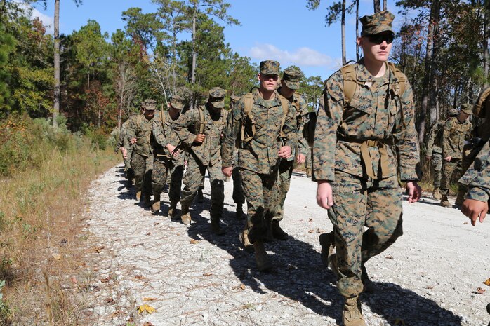 Marines with Marine Aviation Logistics Squadron 29 participate in a six-mile motivational hike, Nov. 4. The Marines reached their hiking destination and boarded CH-53E Super Stallions for transport to their origin point.
