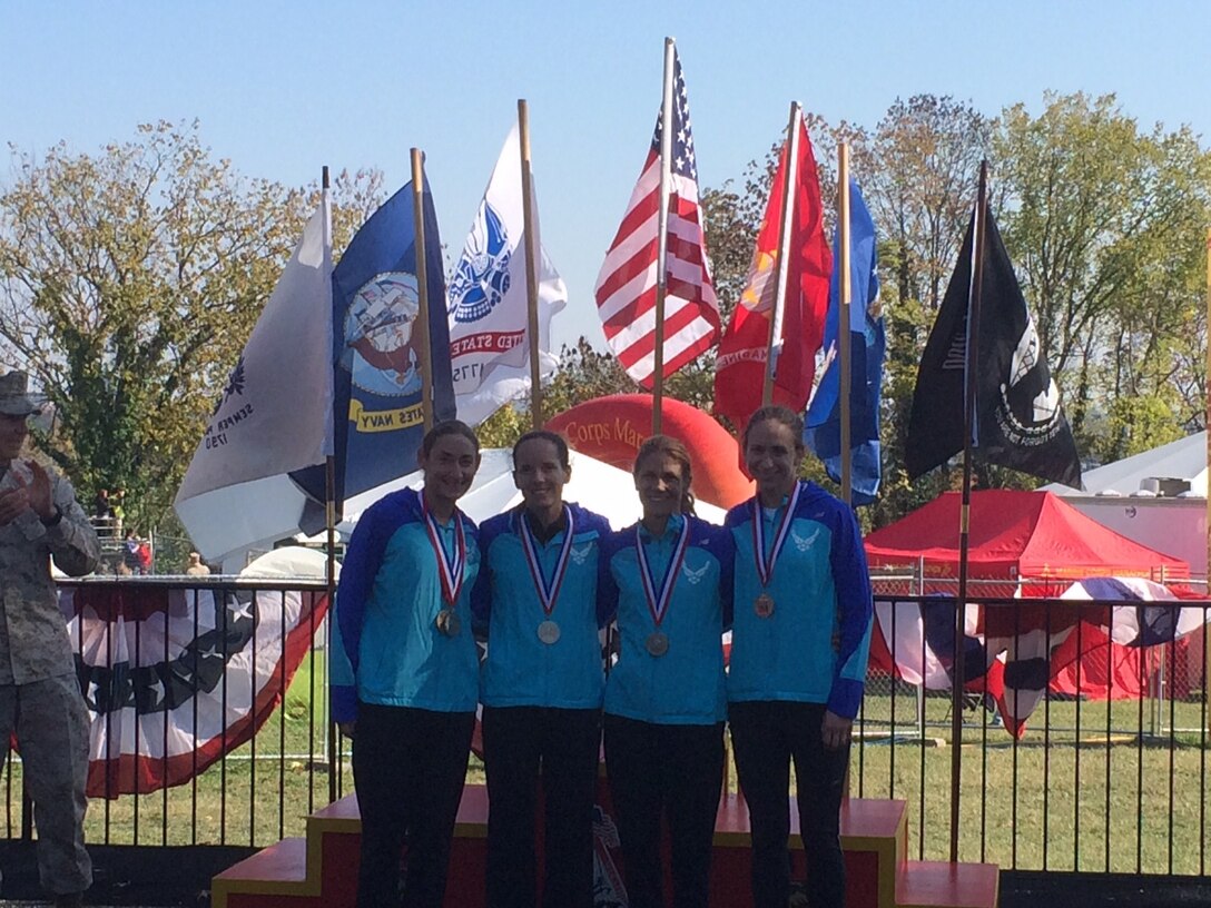 Air Force women's Marathon Team take silver medal at the Armed Forces Marathon Championship, part of the 2013 Marine Corps Marathon on 27 October.  From left to right:  SrA Emily Shertzer. Maj Elissa Ballas, LtCol Brenda Schrank, and 2d Lt Katherine Ross.