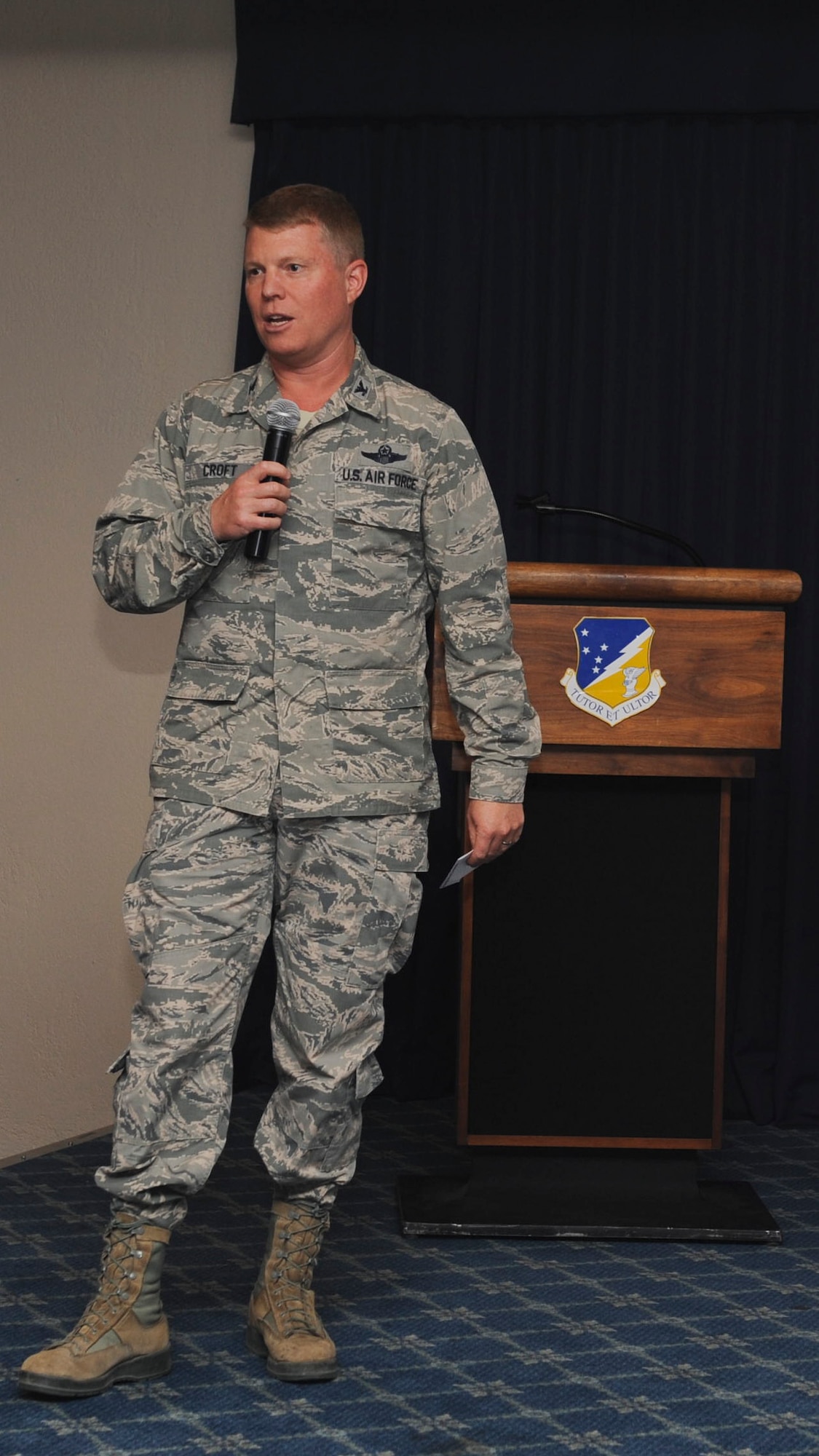Colonel Andrew Croft, 49th Wing commander, fields questions from members of Team Holloman during a town hall meeting held at the Desert Sands Club, Holloman Air Force Base N.M. Oct. 29. Croft hosted the meeting to get feedback and suggestions from the base community. (U.S. Air Force photo by Airman 1st Class Colin Cates/Released) 