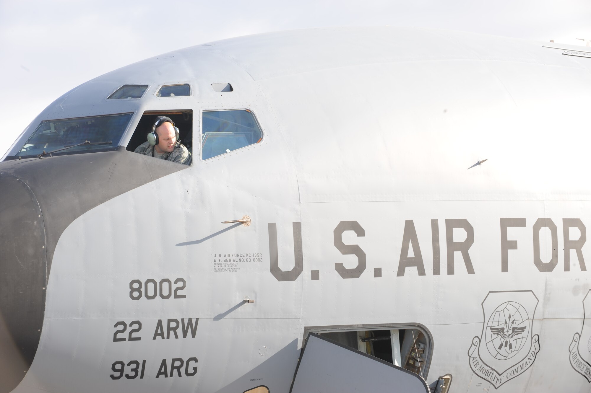 Staff Sgt. Kyle Burks, 22nd Maintenance Squadron electrical environmental craftsman, looks out of a KC-135 Stratotanker Nov. 1, 2013, at McConnell Air Force Base, Kan.  As an electrical environmental craftsman, he troubleshoots, inspects and repairs aircraft systems. (U.S. Air Force photo/Senior Airman Maurice A. Hodges)