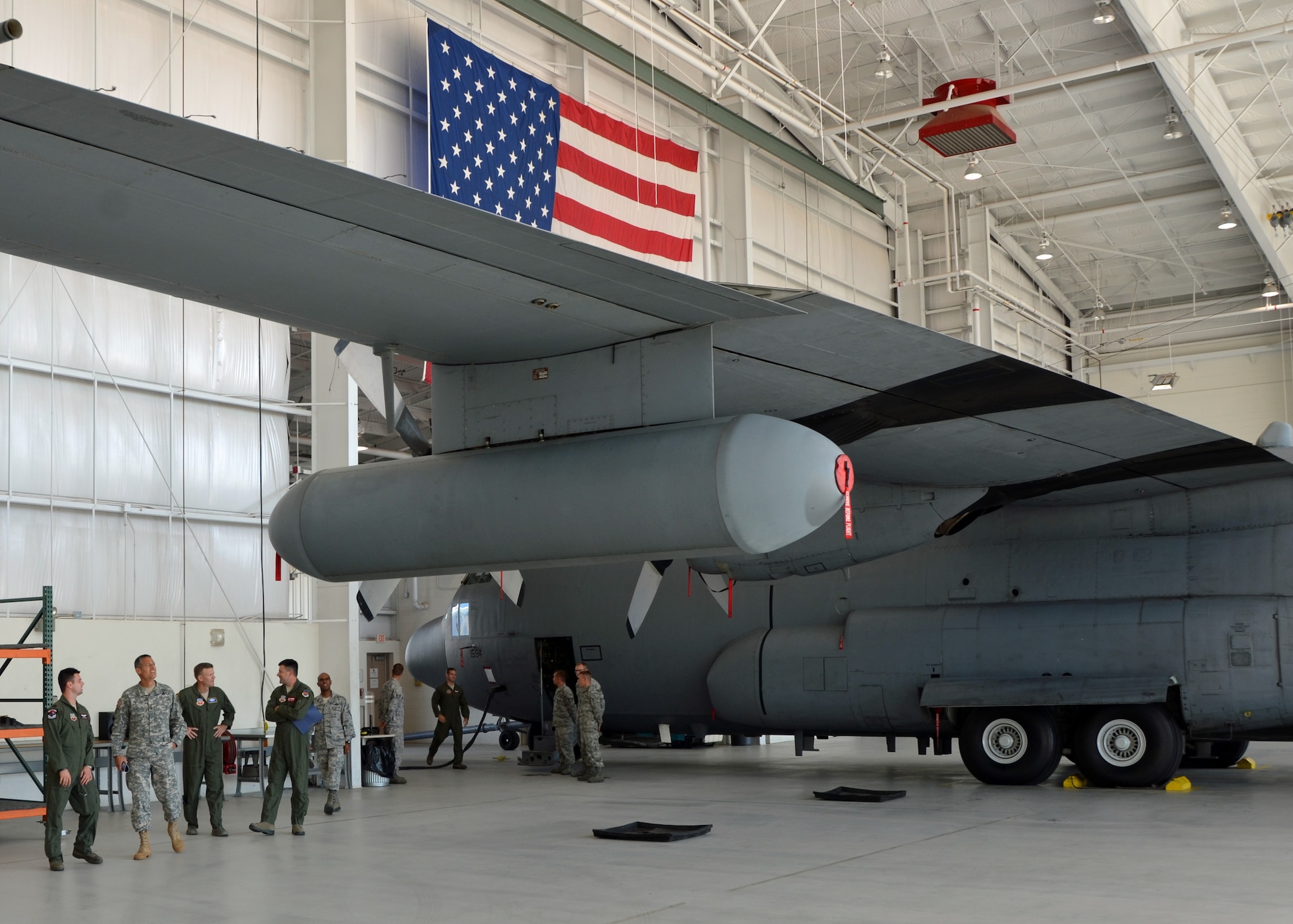 U.S. Army Lt. Gen. Ken Tovo, U.S. Southern Command deputy commander, talks with a pilot about the EC-130 Compass Call during a tour of the 55th Electronic Combat Group at Davis-Monthan Air Force Base, Ariz., Tuesday.  General Tovo visited the base to meet with 12th Air Force (Air Forces Southern) Airmen and thank them for their contributions as the air component to U.S. Southern Command. (U.S. Air Force photo/Capt. Justin Brockhoff)