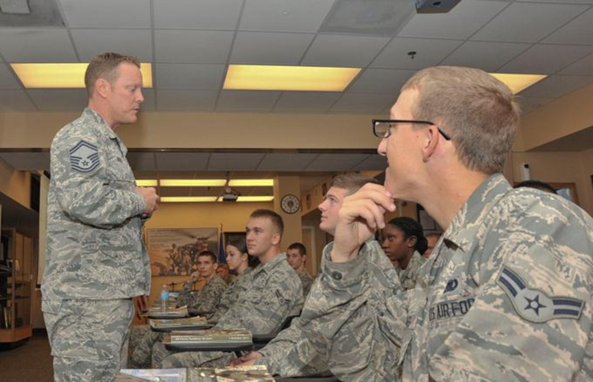 Senior Master Sgt. Scott Reed, Hurlburt Field career assistance advisor, speaks to Airmen at the Commando Pride Airman Center on Hurlburt Field, Fla., Nov. 1, 2013. Reed regularly teaches classes and speaks to squadrons to offer career advice. (U.S. Air Force photo/Airman 1st Class Andrea Posey)