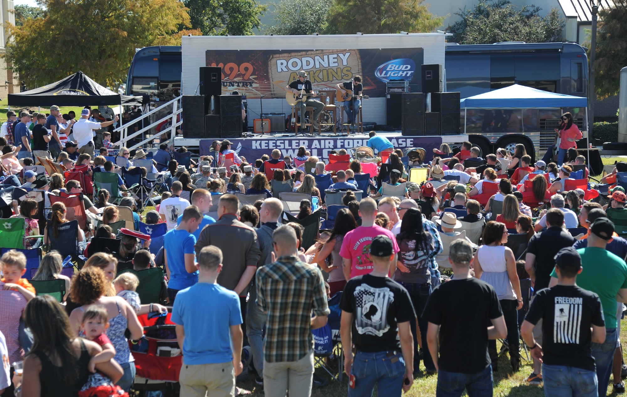 Country singer Rodney Atkins performs with Liam Bailey during a concert Nov. 2, 2013, at the Triangle Parade Field, Keesler Air Force Base, Miss.  Local band, Autumn Rise-N, also performed.  (U.S. Air Force photo by Kemberly Groue)