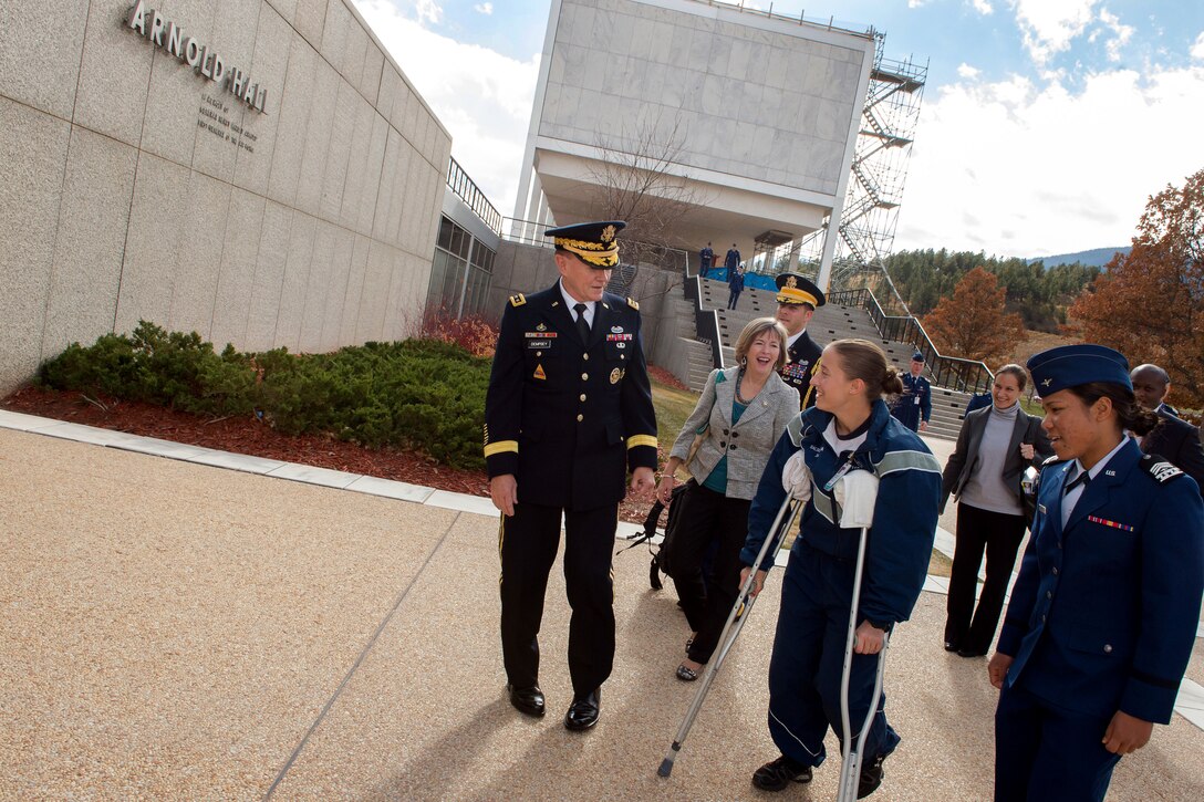 U.S. Army Gen. Martin E. Dempsey, chairman of the Joint Chiefs of Staff, speaks to a U.S. Air Force Academy cadet at Peterson Air Force Base, Colorado Springs, Colo., Nov. 1, 2013. Dempsey also attended the Air Force’s annual conference for Coordinating Research on the North Atlantic, also known as Corona, during his two-day visit to Colorado. (DOD photo by U.S. Navy Petty Officer 1st Class Daniel Hinton/Released)