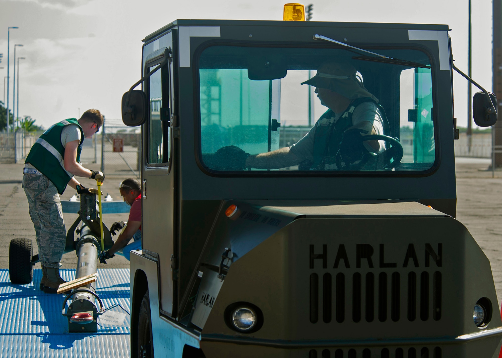 Joint Base Pearl Harbor-Hickam personnel prepare equipment for transport near the flightline during an Operational Readiness Inspection at JBPHH, Hawaii, Nov. 3, 2013. The Consolidated Unit Inspection evaluated Airmens’ ability to respond to survive and operate during various wartime conditions. (U.S. Air Force photo/Tech. Sgt. Jerome Tayborn) 