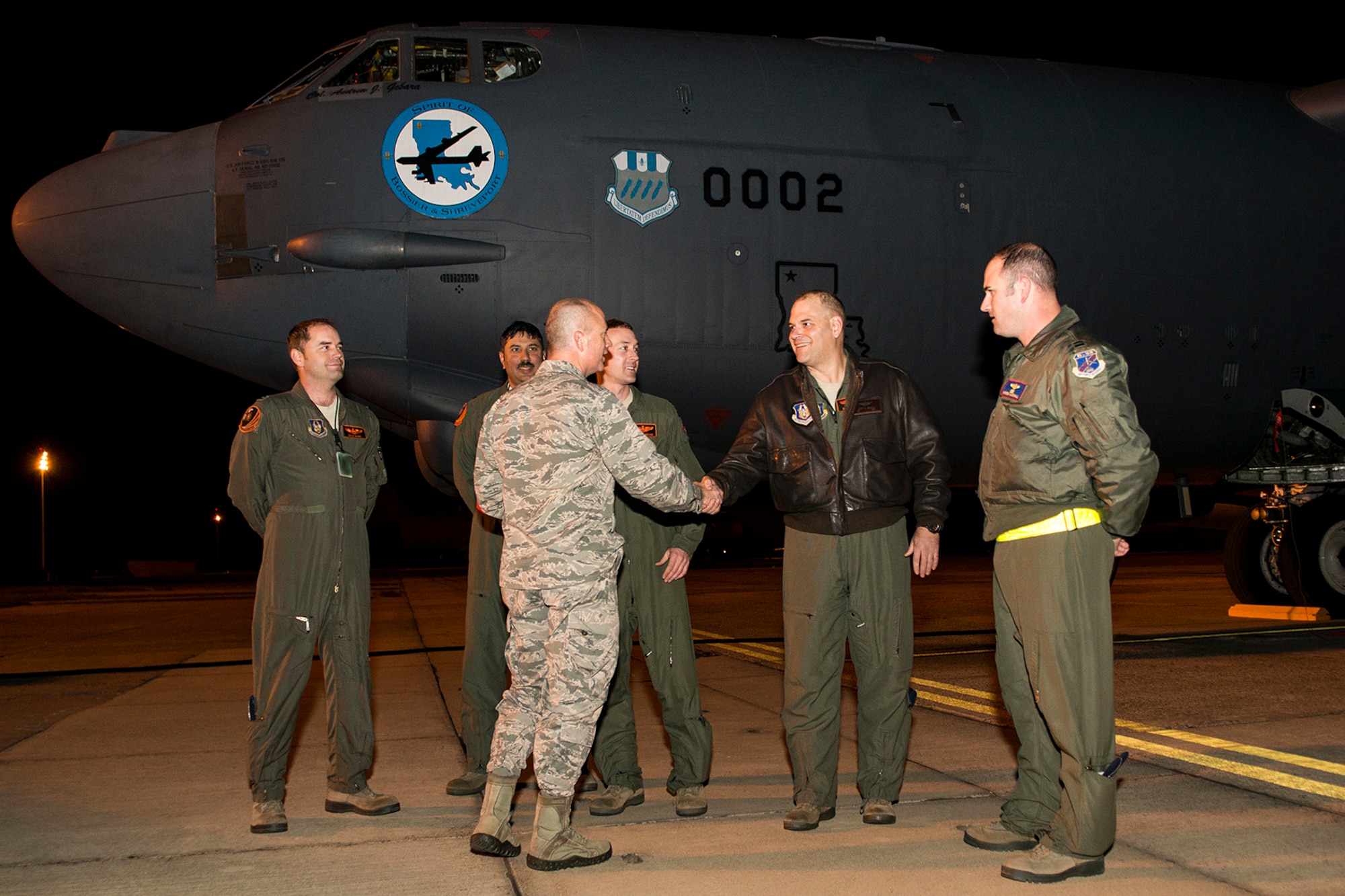 U.S. Air Force Col. Jonathan Ellis, 307th Bomb Wing commander, welcomes home an aircrew assigned to the 343rd Bomb Squadron following their return from participating in a routine exercise, Nov. 3, 2013, Barksdale Air Force Base, La. The exercise trains U.S. Airmen to deter, and if necessary, defeat a military attack against the United States. (U.S. Air Force photo by Master Sgt. Greg Steele/Released)