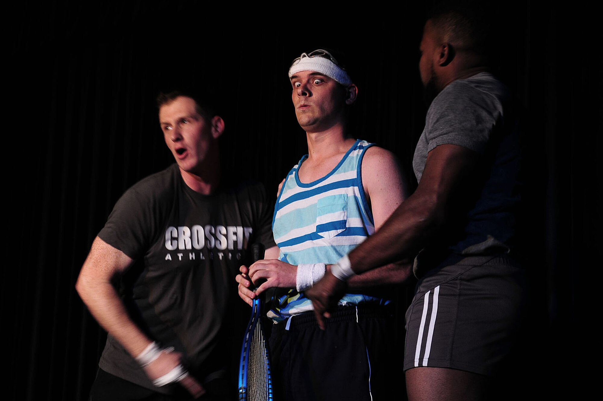 Airman 1st Class Nicholas Crisp, American Forces Network-Incirlik broadcaster, performs during an exercise comedy skit during the Saturday Night Live Incirlik 2 comedy show Nov. 2, 2013, at Incirlik Air Base, Turkey. More than 250 people attended the free event which was put on by a base group called the Raconteurs. (U.S. Air Force photo by Airman 1st Class Nicole Sikorski/Released))