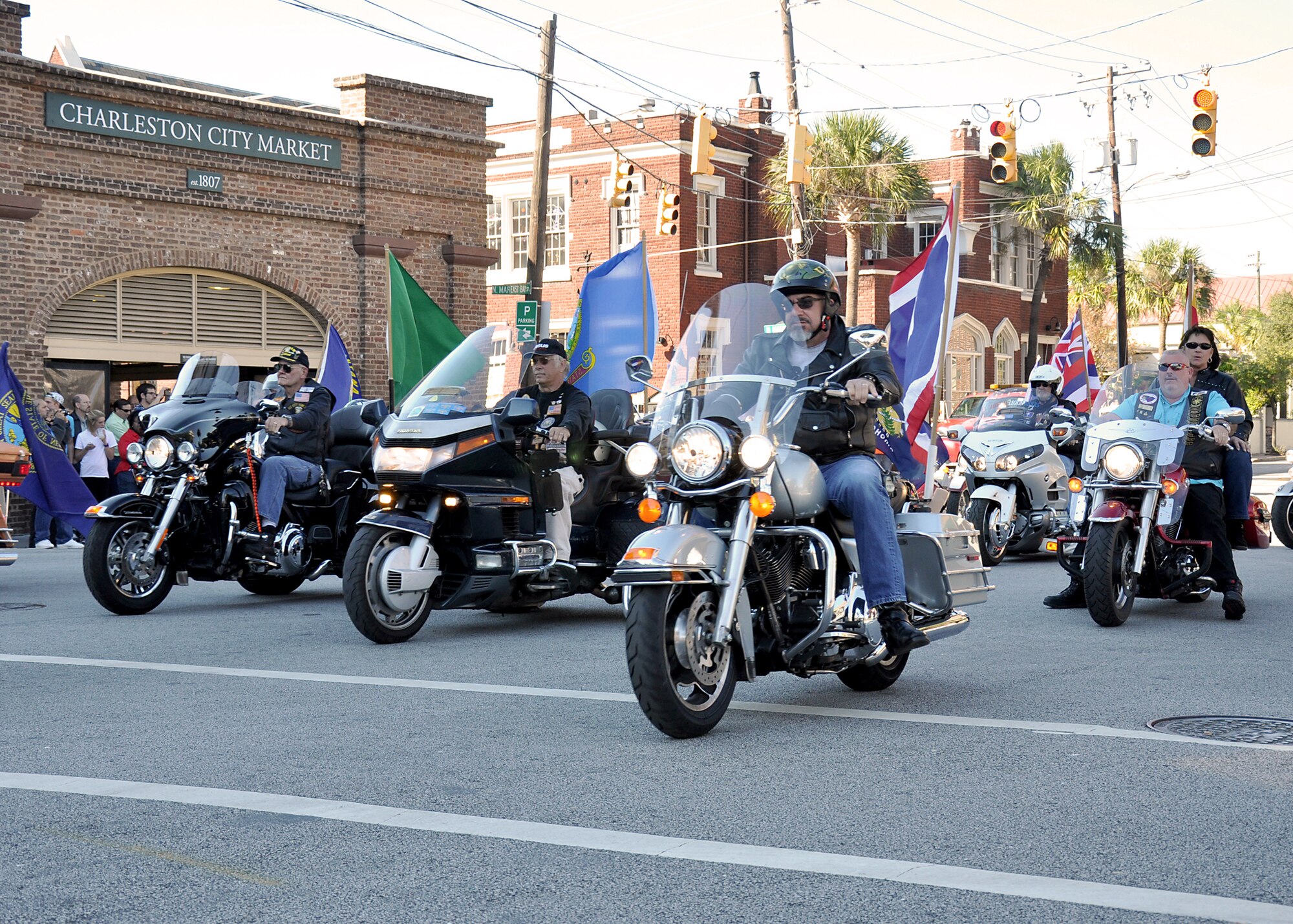 Members of the 315th Airlift Wing participated in the annual Charleston Veteran's Day parade in Charleston's downtown historic district Sunday. The parade was organized by the Ralph H. Johnson VA Medical Center and included marching bands, historic military vehicles, floats, motorcycle groups and veterans service organizations from the Charleston area. (U.S. Air Force Reseve photo by Senior Airman Bobby Pilch)