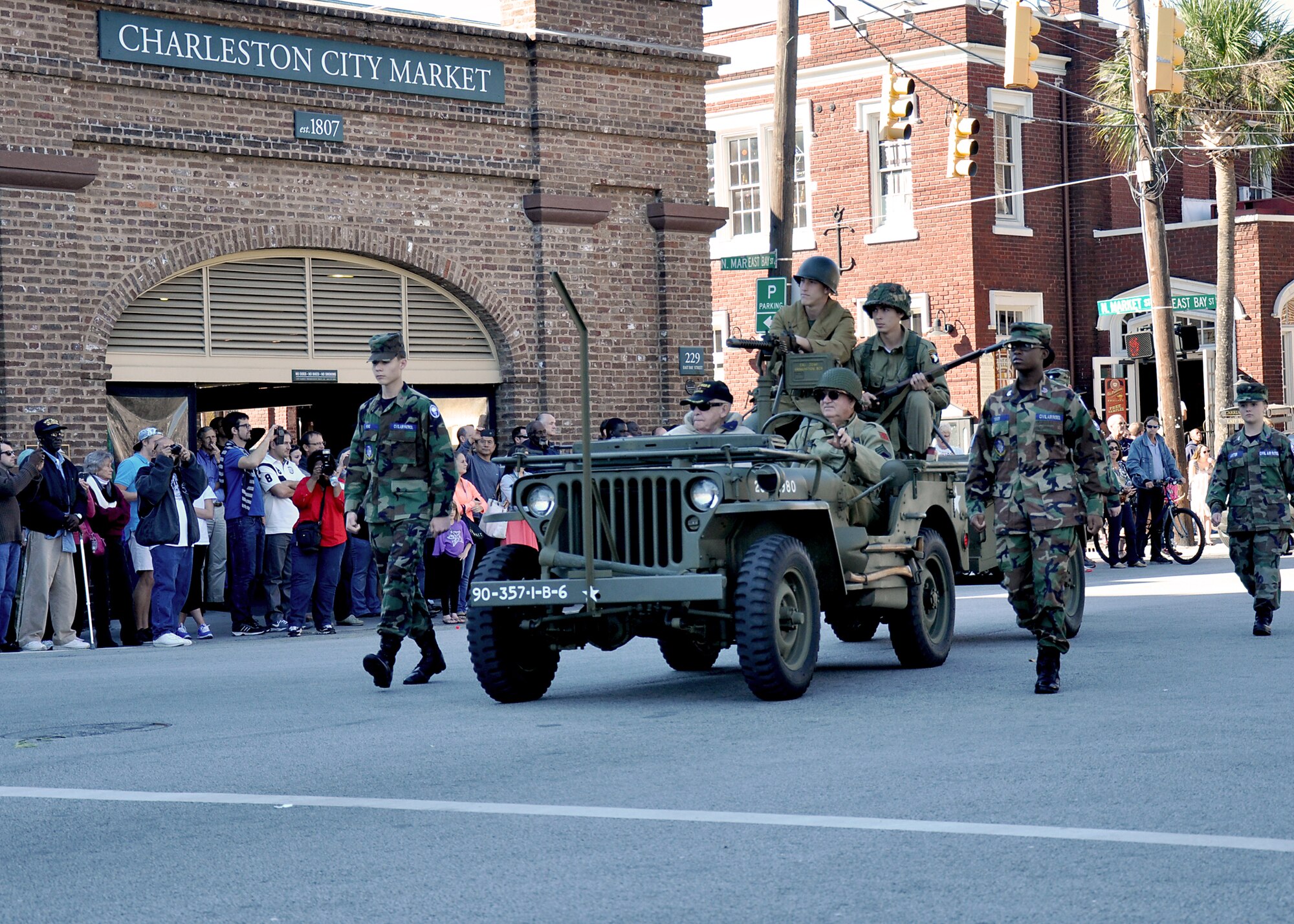 Members of the 315th Airlift Wing participated in the annual Charleston Veteran's Day parade in Charleston's downtown historic district Sunday. The parade was organized by the Ralph H. Johnson VA Medical Center and included marching bands, historic military vehicles, floats, motorcycle groups and veterans service organizations from the Charleston area. (U.S. Air Force Reseve photo by Senior Airman Bobby Pilch)
