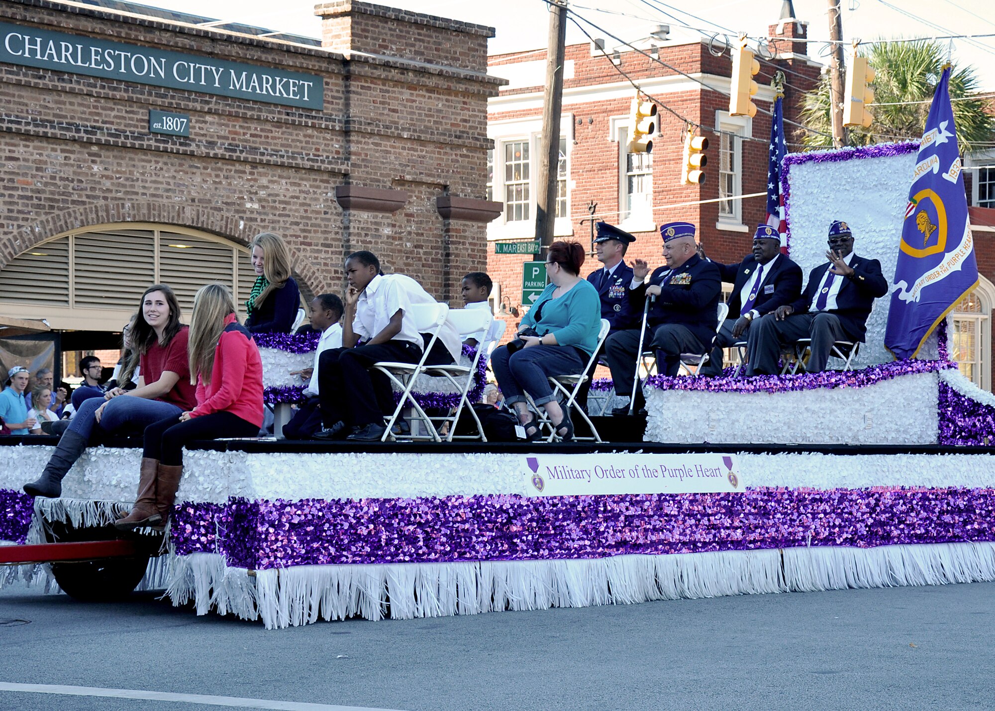 Members of the 315th Airlift Wing participated in the annual Charleston Veteran's Day parade in Charleston's downtown historic district Sunday. The parade was organized by the Ralph H. Johnson VA Medical Center and included marching bands, historic military vehicles, floats, motorcycle groups and veterans service organizations from the Charleston area. (U.S. Air Force Reseve photo by Senior Airman Bobby Pilch)