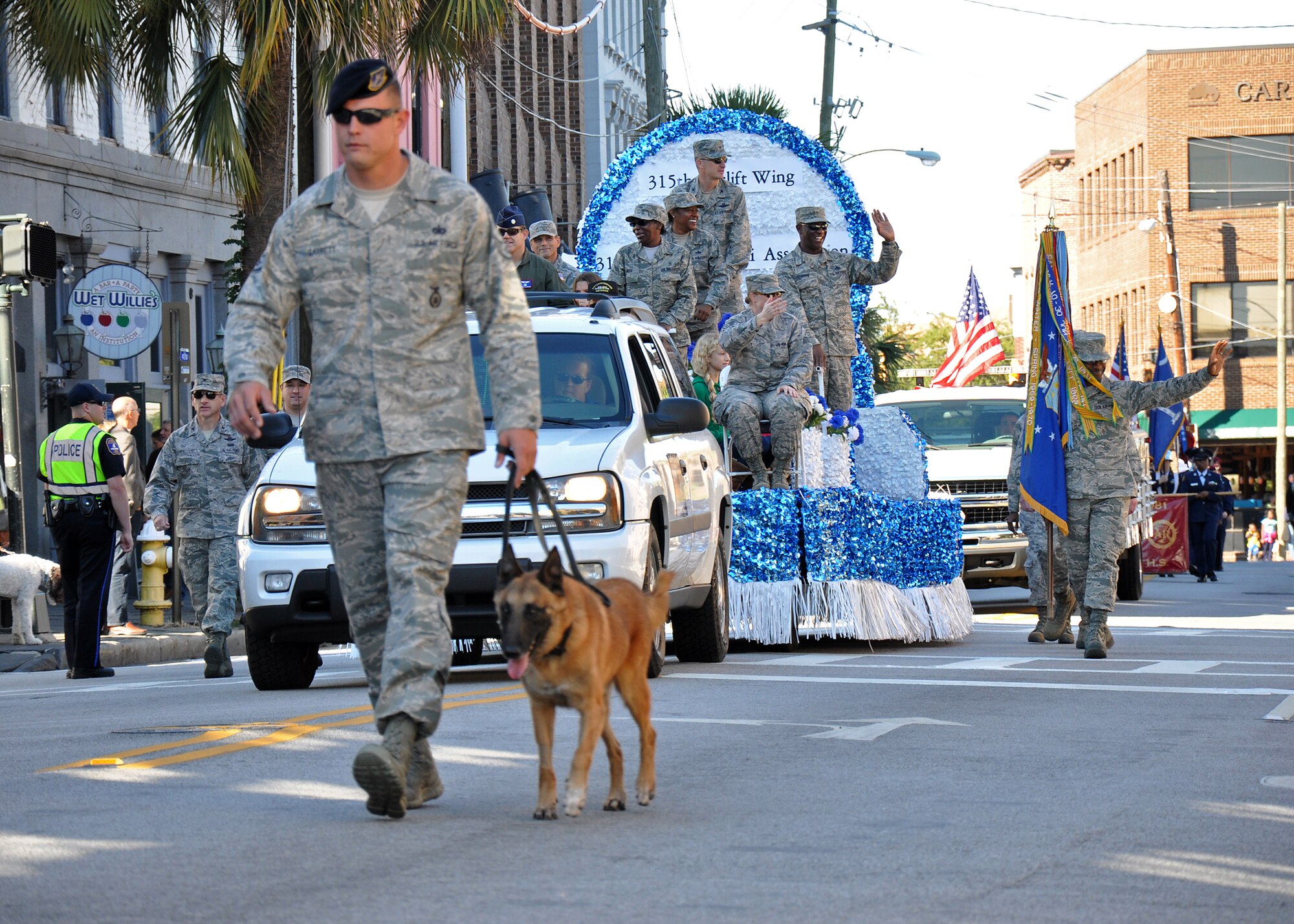 Members of the 315th Airlift Wing participated in the annual Charleston Veteran's Day parade in Charleston's downtown historic district Sunday. The parade was organized by the Ralph H. Johnson VA Medical Center and included marching bands, historic military vehicles, floats, motorcycle groups and veterans service organizations from the Charleston area. (U.S. Air Force Reseve photo by Senior Airman Bobby Pilch)