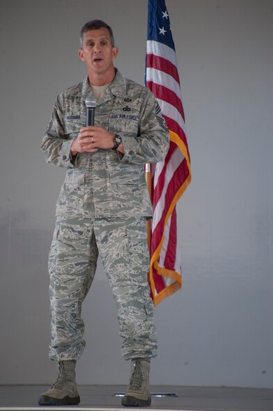 U.S. Air Force Chief Master Sgt. Richard A. Parsons, Air Combat Command command chief, speaks to Airmen about the importance of readiness during an all call at Moody Air Force Base, Ga., Nov. 4, 2013. Parsons served as the 23d Wing command chief at Moody from June 2009 to December 2010. (U.S. Air Force photo by Airman Dillian Bamman/Released)