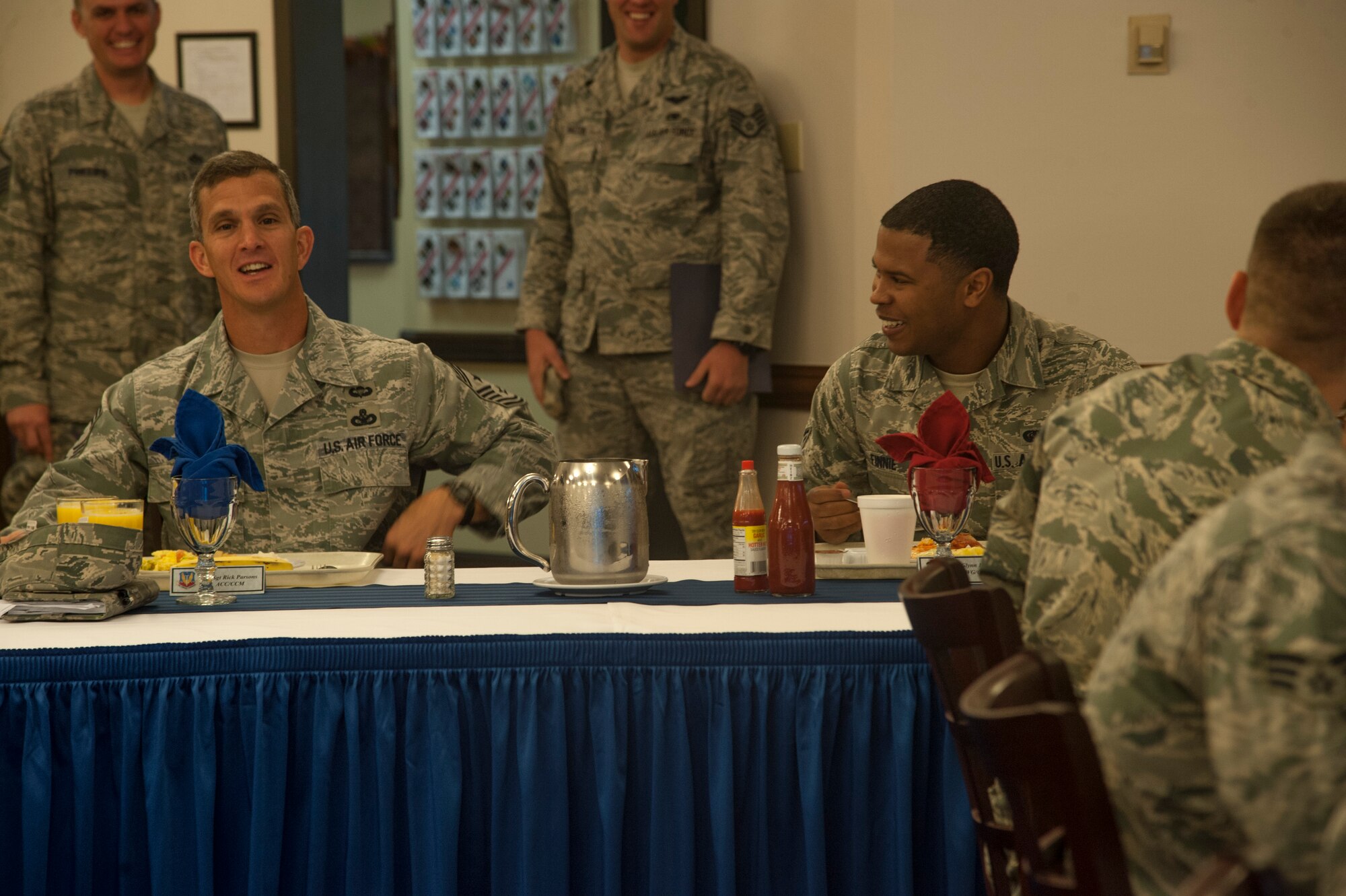 U.S. Air Force Chief Master Sgt. Richard A. Parsons, Air Combat Command command chief, speaks to Senior Airman Glenn Finnie, 23d Wing, about Parsons’ experiences when he was stationed at Moody Air Force Base, Ga., Nov. 4, 2013. Parsons talked about how Moody is in a new culture compared to the 1980s. (U.S. Air Force photo by Airman Dillian Bamman/Released)