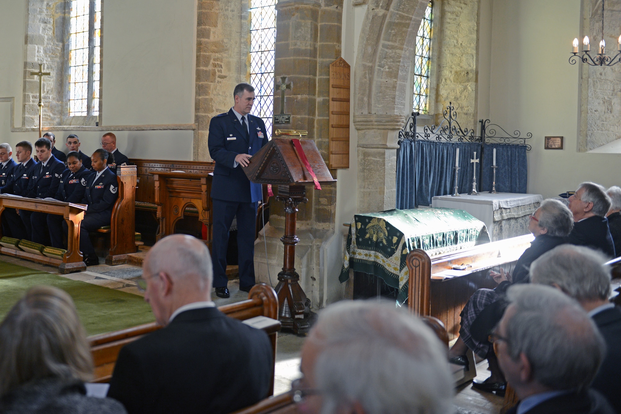 HELMDON, United Kingdom – Col. Charles Hamilton, 422nd Air Base Group commander, speaks during a memorial service for the crew of the Sharon Belle, who lost their lives in a crashed in at the Astwell Castle Farms in 1943. The village and 422nd Air Base Group held a ceremony in honor of the 327th Bombardment Squadron, VIII Bomber Command, Airmen killed Nov. 30, 1943, when they left RAF Poddington on a bombing mission to Germany, and their plane crashed at Astwell Castle Farms. (U.S. Air Force photo by Tech. Sgt. Chrissy Best)