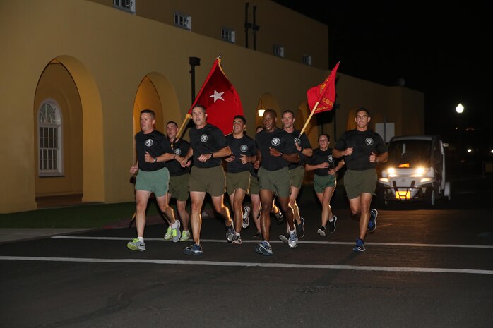 Brig. Gen. James W. Bierman, commanding general, MCRD San Diego and WRR, runs with his staff during the Marine Corps Birthday Dedication Run aboard the depot, Nov. 5.  Marines of the depot take turns running one mile for every year since the birth of the Corps in 1775, for a total of 238 miles.