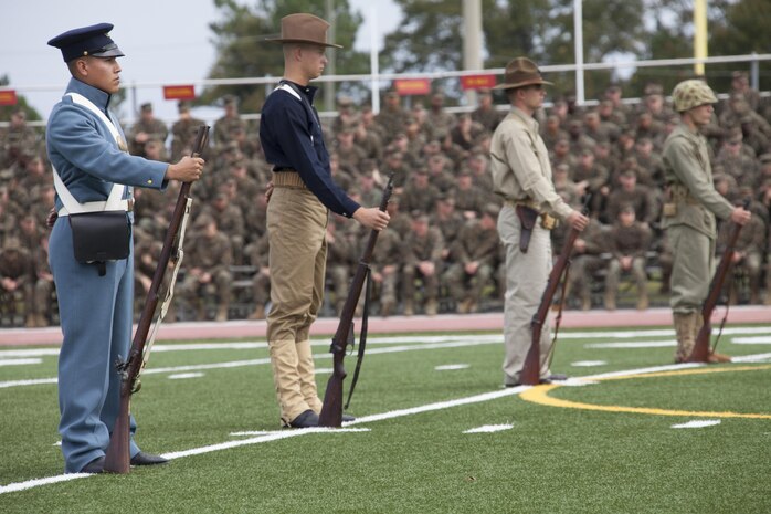 U.S. Marines that were part of the ceremonial pageant stand at parade rest during the Joint Daytime Ceremony aboard Camp Lejeune, N.C., Nov. 6, 2013. The ceremony is held every year in honor of the Marine Corps birthday. (U.S. Marine Corps photo by Lance Cpl. Andre Dakis, COMCAM, MCI-East, Camp Lejeune/Released)