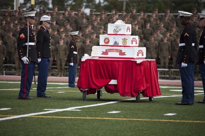 U.S. Marines that were part of the cake detail stand at attention during the Joint Daytime Ceremony aboard Camp Lejeune, N.C., Nov. 6, 2013. The ceremony is held every year in honor of the Marine Corps birthday. (U.S. Marine Corps photo by Lance Cpl. Andre Dakis, COMCAM, MCI-East, Camp Lejeune/Released)