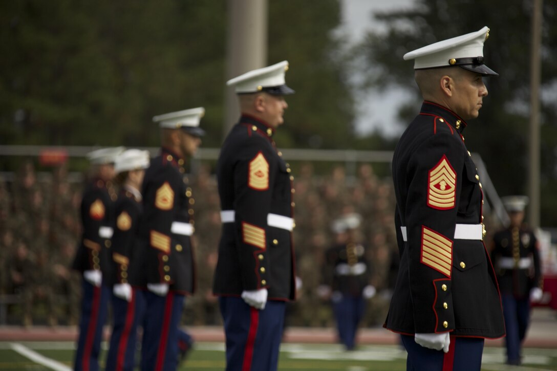 U.S. Marines with the senior escort detail stand at attention during the Joint Daytime Ceremony aboard Camp Lejeune, N.C., Nov. 6, 2013. The traditional ceremony is held every year in honor of the Marine Corps birthday. (U.S. Marine Corps photo by Cpl. Adrian Weekly, Combat Camera, MCB Camp Lejeune/Released)