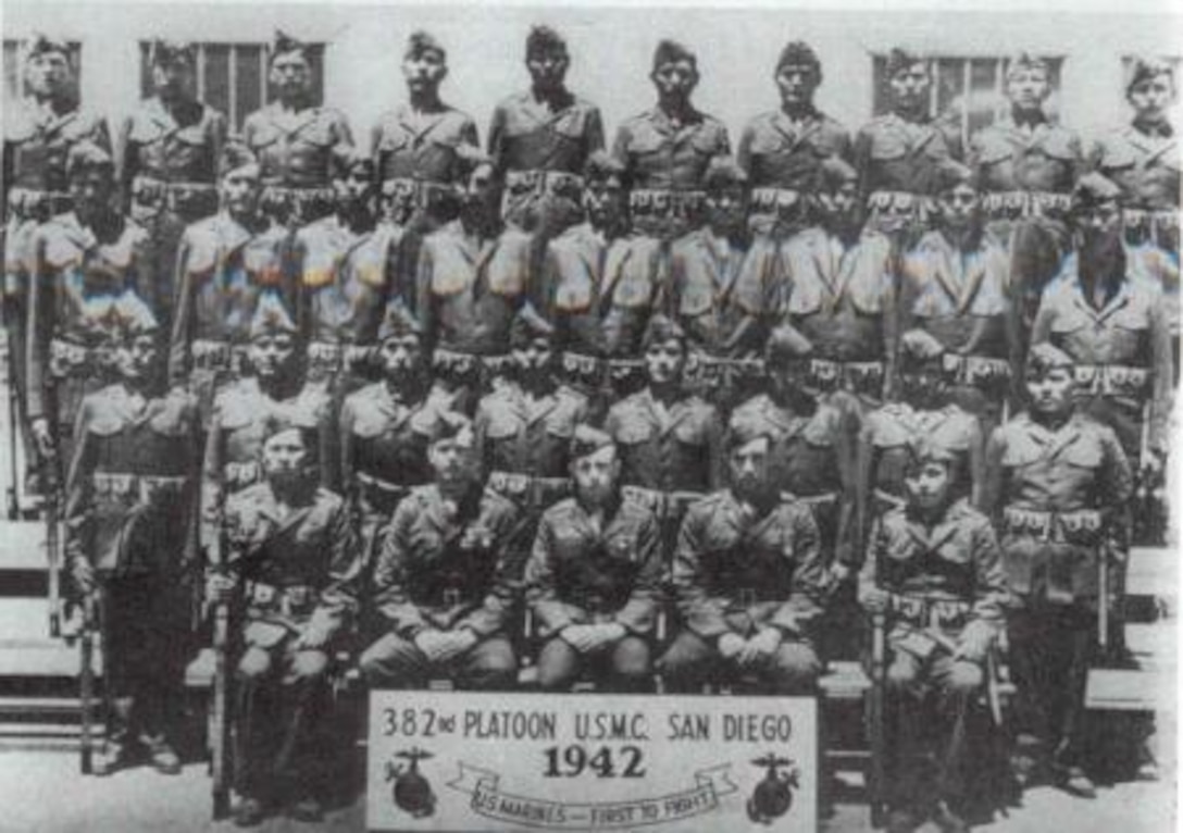 A platoon of Navajo Marines pose for a group photo upon graduating recruit training, in San Diego, 1942. The Navajo Marines turned their language into an unbreakable code during World War II.


