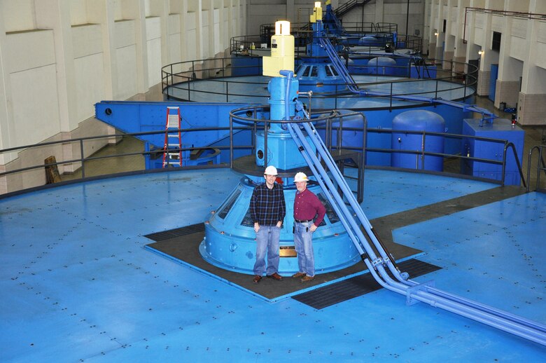 From left, Jamie Holt, power plant specialist, and Jamie James, project manager, stand atop U.S. Army Corps of Engineers Nashville District’s recently repaired Barkley Hydropower Plant Unit 1 generator Kuttawa, Ky. The unit suffered a phase-to-ground fault resulting in a fire that damaged the 32.5 Megawatt generator wirings in Dec. 19, 2010. The $11.5 million, major repair project began Aug. 15, 2012 when contractor employees lifted the 270-ton assembly by crane and placed it on a nearby pedestal for repair by National Electric Coil from Columbus, Ohio. Unit 1 was placed back on line Nov. 18, 2013.