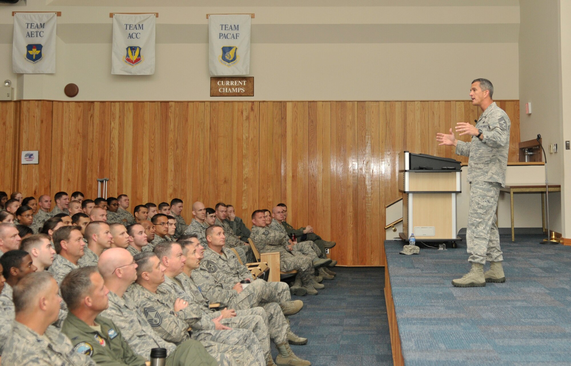 Chief Master Sgt. Richard A. Parsons, Air Combat Command command chief, speaks to Tyndall Airmen during a visit Nov. 5 at the 53rd Weapons Evaluation Group auditorium. During his speech, the command chief stressed importance of readiness and addressed concerns about future Air Force changes. (U.S. Air Force photo by Airman 1st Class Alex Echols)