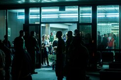 Friends and family of the deployed members of the 437th Airlift Wing and 14th Airlift Squadron wait with anticipation as Airmen began escorting them to the flight line at Joint Base Charleston — Air Base, S.C. on November 2, 2013. (U.S. Air Force photo/Airman 1st Class Michael Reeves)