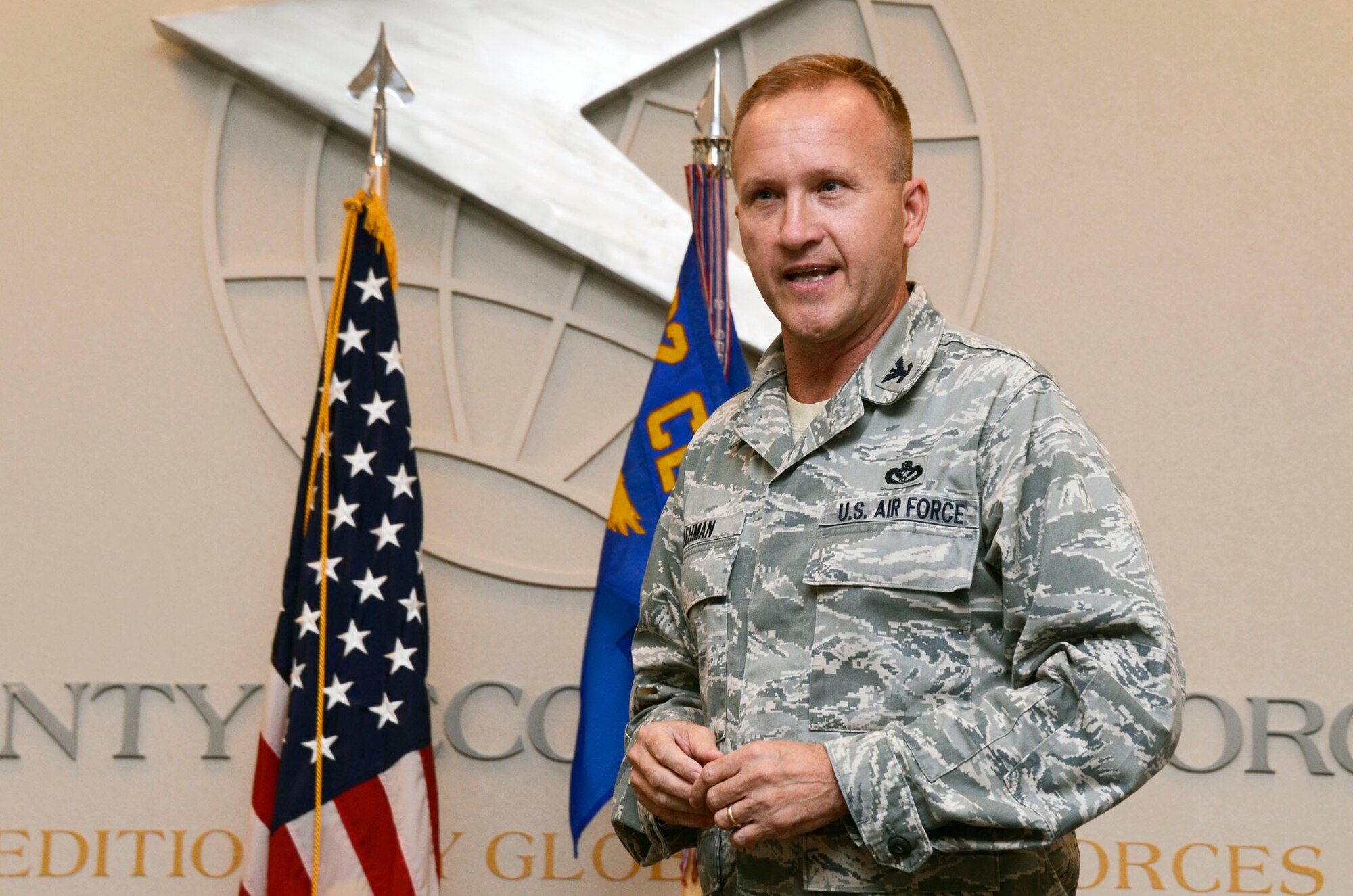 Col. James E. Lehman, 622nd Civil Engineer Flight commander addresses an audience attending his Assumption of Command ceremony here at Dobbins Air Reserve Base, Ga. Nov. 1. Lehman will be responsible for providing command staff augmentation for engineer management, technical design, construction management, command and control in support of regional contingencies or natural disasters during wartime or stability operations.  (U.S. Air Force photo/Don Peek)